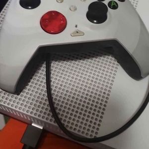 Xbox one s 1tb  with a controller and 4games